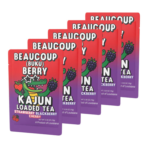 Product photo showing a group of five Beaucoup Berry packets fanned out. The front packet shows the alligator mascot with star-shaped sunglasses, holding a strawberry and a blackberry, with the Strawberry,  Blackberry, and Cherry flavor clearly marked.