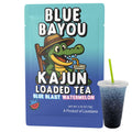  Image of a single Blue Bayou packet (featuring the seated alligator mascot) next to a clear cup of the prepared, dark blue loaded tea.